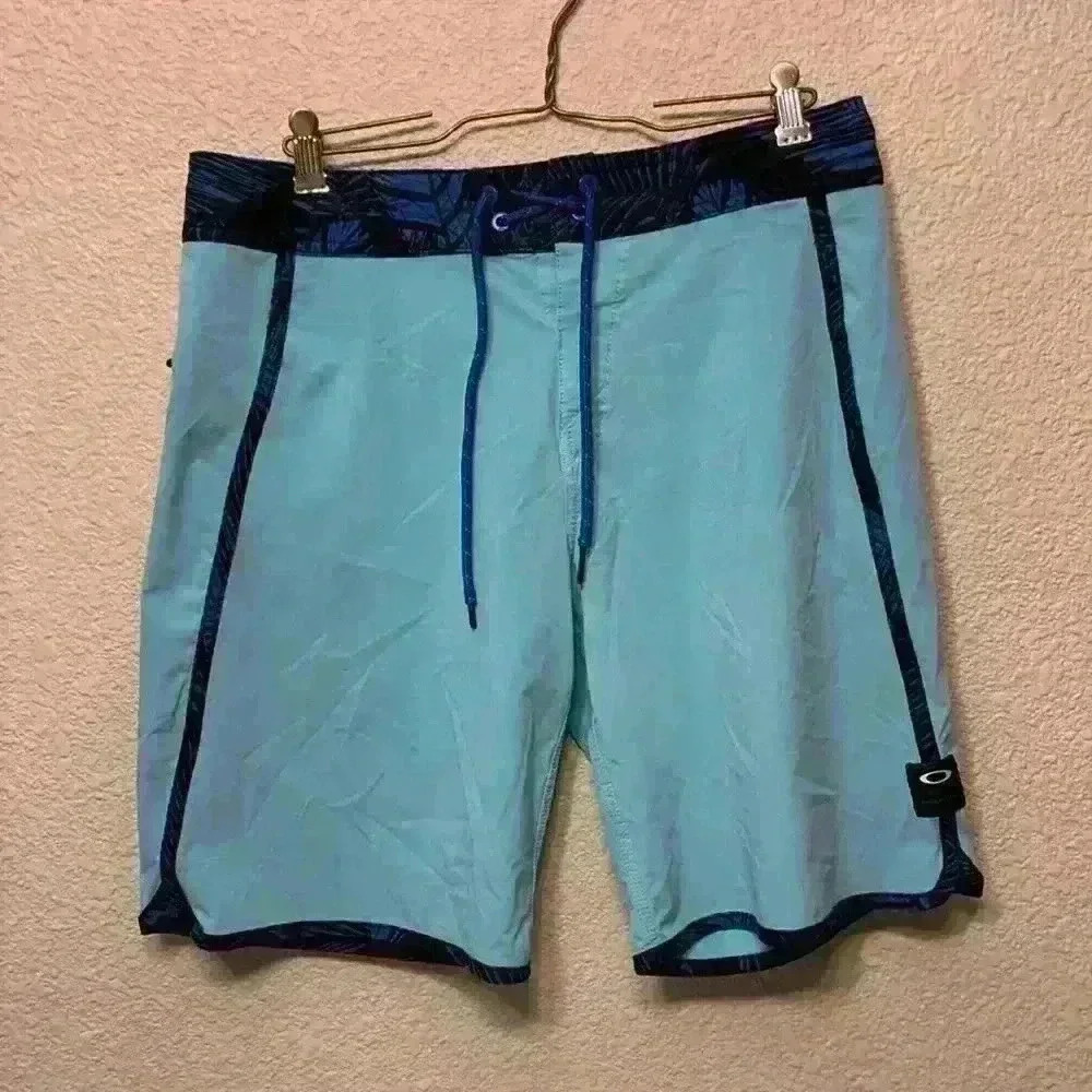 Oakley blue Men’s swim trunks sz S beach vacation resort wear swim suit shorts